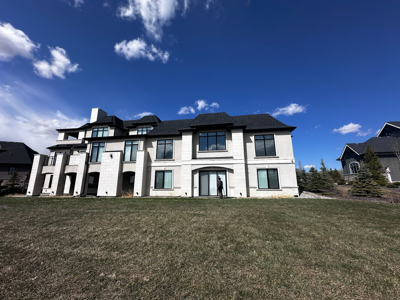 Custom home exterior windows cleaned by Clarity Co. in Calgary
