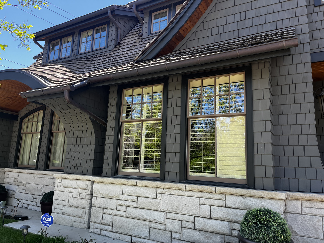 Custom home exterior windows cleaned by Clarity Co. in Calgary